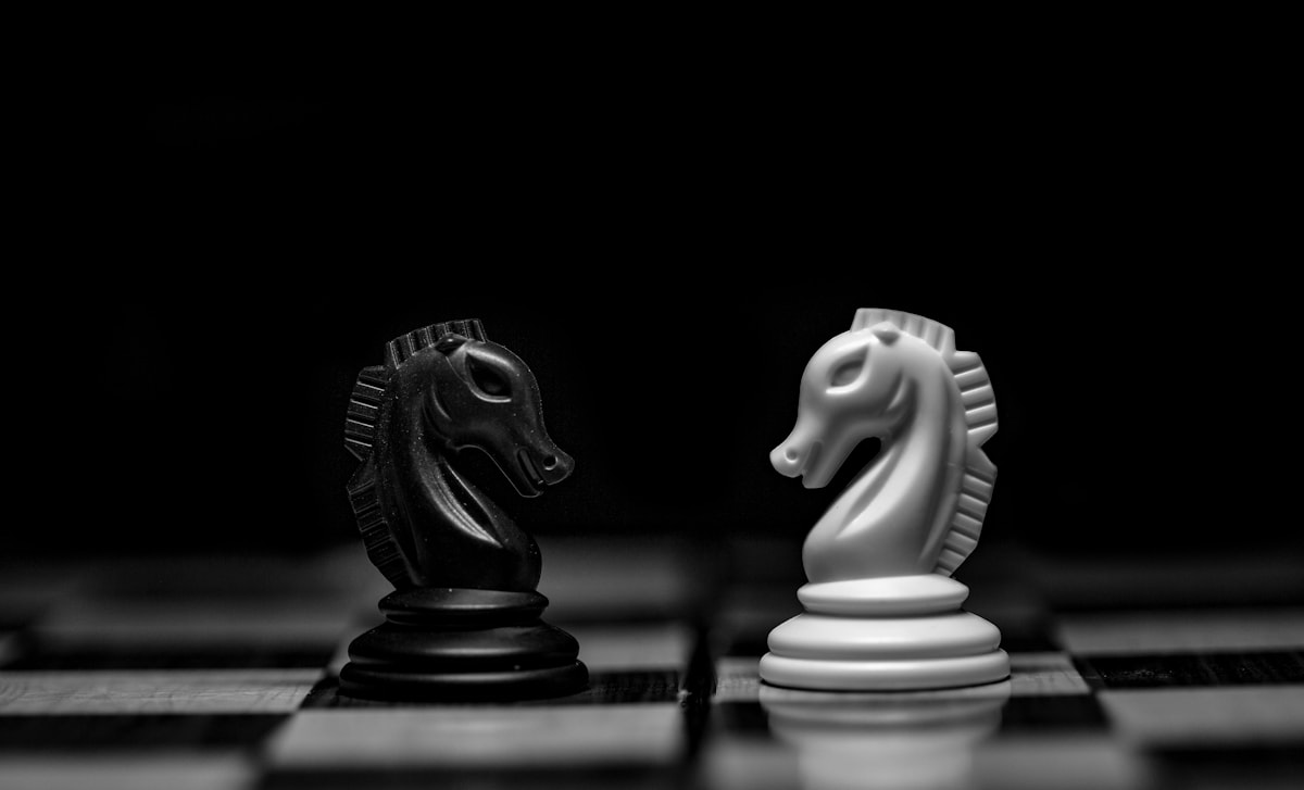 Think Fanny logic puzzle mood with chess pieces on a dark table